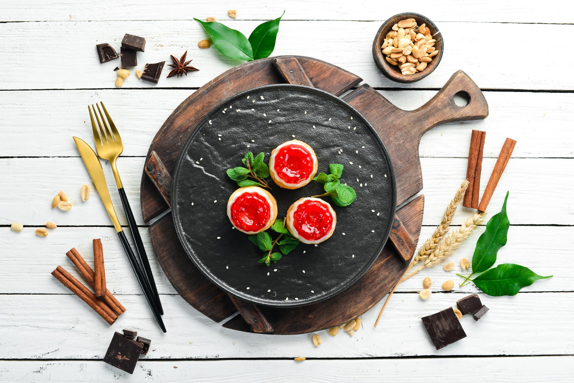 Set of plated desserts on wooden table